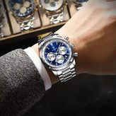 POEDAGAR Original watch 《highe quality》 🔥پوداگار مدلی نو کرنوگراف رفرانس 921B دارای روز شمار نمایش مون استار عقربه شب نما برند اورجینال شرکتی بند استیل ضدآب تا عمق بالا رنگ ثابت قفل دو پروانه موتور کوارتز
